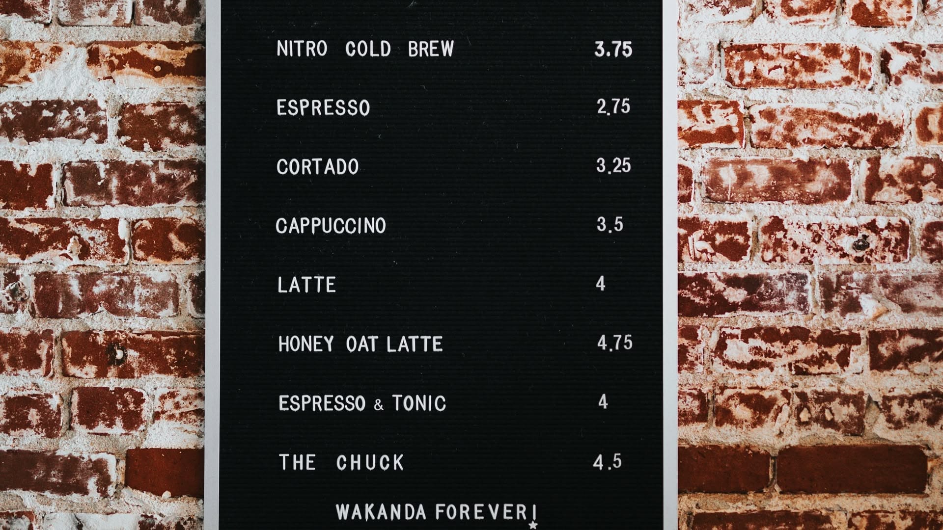 A black and white menu board