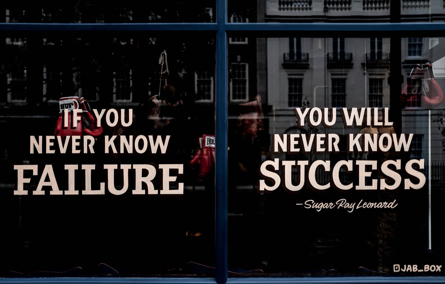 A shop window painted with the words: if you never know failure, you will never know success