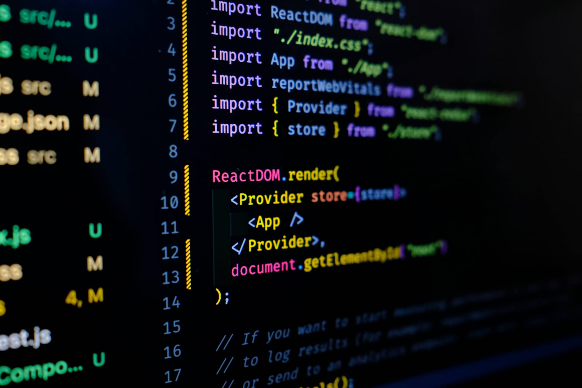A code editor on a dark screen showing a file tree and import statements